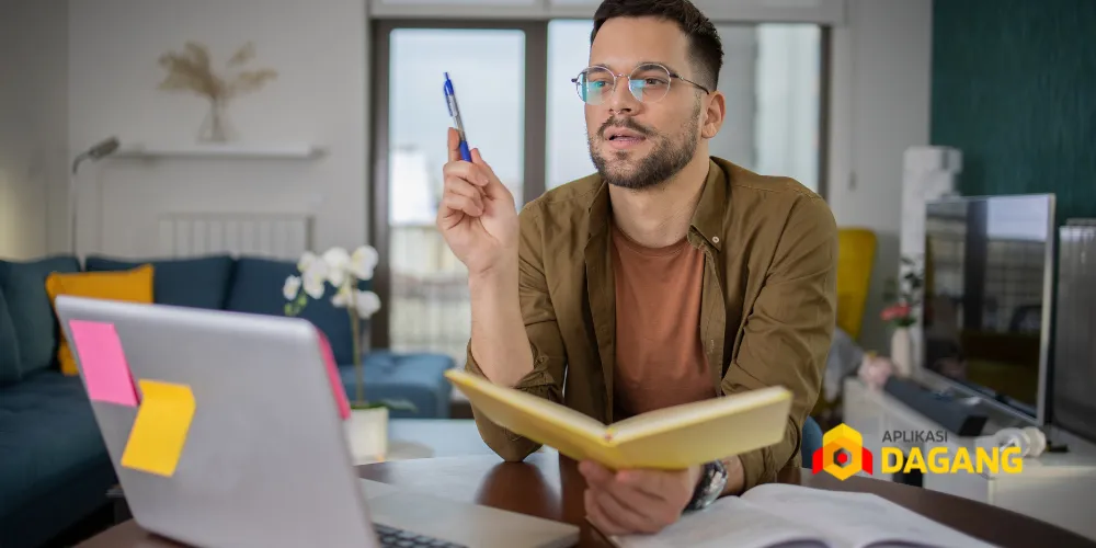 Tim digital marketing Aplikasi Dagang sedang menganalisis performa kampanye online